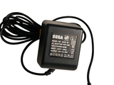 a black charger that is plugged into the wall