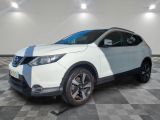 the white nissan qx sport suv is parked on a checkered floor