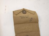 a small piece of cloth with a button on it