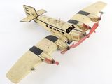 a toy airplane that is sitting on a white surface