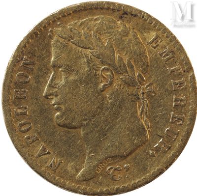 a close up of a gold coin with a woman ' s face on it