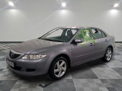 a picture of a car that is parked in a garage