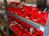 many red bins on the shelves in the room