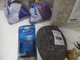 various items that are on the counter in the bathroom