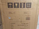 a cardboard box with a label on it sitting on a table