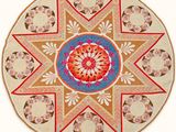 une image représentant un tapis rond orné d'un motif floral