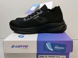 a pair of black running shoes on top of a box