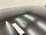 a remote control sitting on the floor of a room