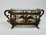 a glass bowl with an eagle design on it