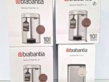 three boxes of brabantia coffee machines sitting on a table