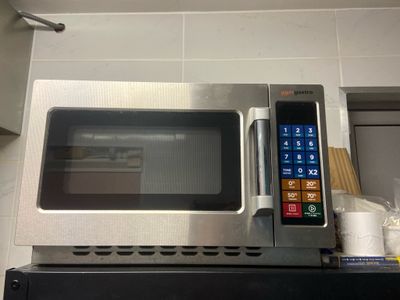 a microwave that is sitting on top of a counter