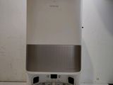 an image of a white and gray air purifier on a counter