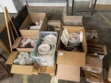 many boxes of assorted items sitting on the floor
