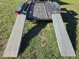 an image of a flatbed trailer parked in a field