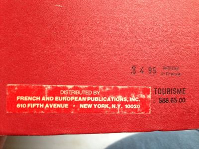 a red box with a sticker on it that says french and european publications inc