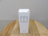 a picture of a white box on a wooden table