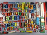 a lot of toy cars that are on the table