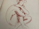 a drawing of a nude woman sitting on the ground