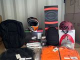 a box with a helmet, helmet, and other items on it