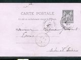 une photo d'une carte postale sur laquelle figure un timbre