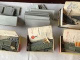 six boxes of toy trains sitting on a table