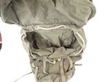 a bag that is sitting on the ground next to a shoe