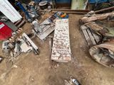 a lot of junk on the ground in a garage