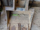 a small chair that is sitting on the ground
