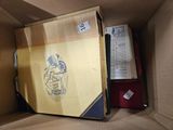 a cardboard box with a drawing of a woman in a dress