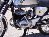 a motorcycle that is parked on the side of the road