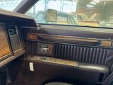 a car dashboard with a television in the middle of it