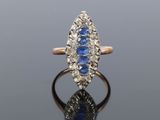 an antique sapphire and diamond cluster ring