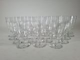 a lot of empty wine glasses sitting on a table