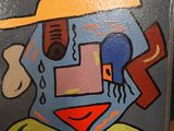 a picture of a painting of a man with a hat on
