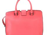a pink handbag on a white background