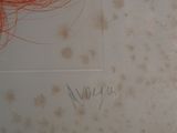 a drawing on the wall of a bathroom with stains on it