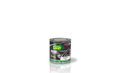le pot de peinture est posé sur une surface blanche
