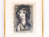 l'image d'un dessin d'un visage de femme dans un cadre doré
