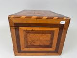 an old wooden box with a wooden lid on a white background