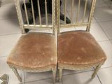 two chairs that are sitting next to each other on the floor