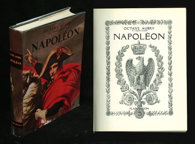 two books are sitting on a table next to each other
