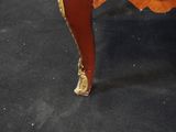 an image of a red table with gold accents