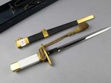 two knives that are sitting next to each other on a table