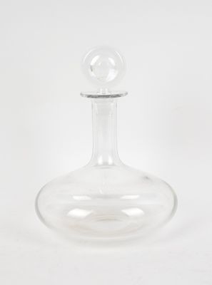 clear glass decanter on a white background with a white background