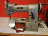 a sewing machine that is sitting on a table