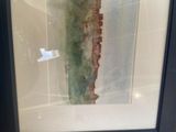 a picture of a picture of a building in a glass case