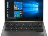 un ordinateur portable avec un clavier et Windows à l'écran