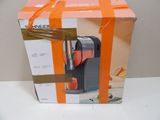 boxed box of a juicer with orange ribbon on top of it