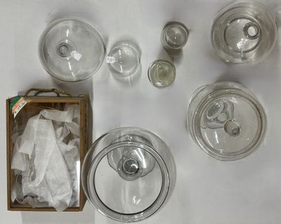 a lot of glass items that are on a table