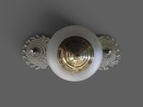 a close up view of a ceiling light with a decorative design on it
